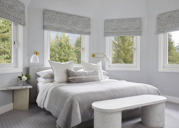 Grey and white bedroom with turret windows