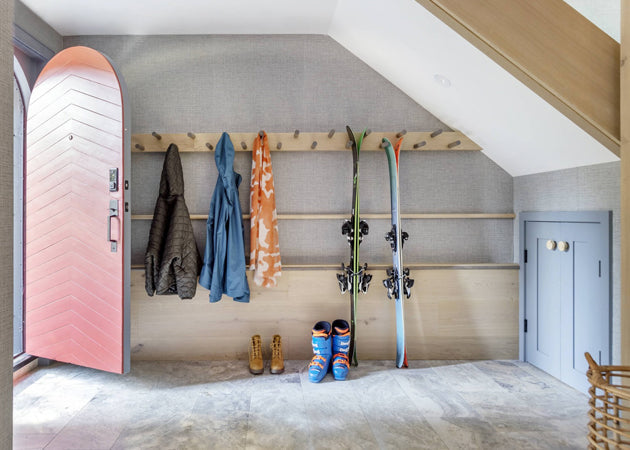 Mudroom with arched doorway