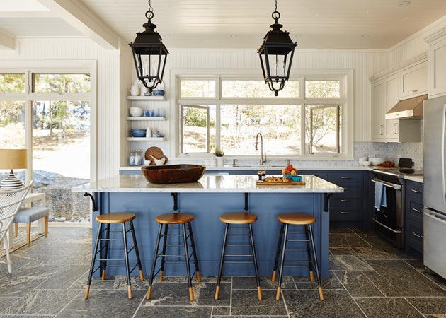 Cottage kitchen with blue island